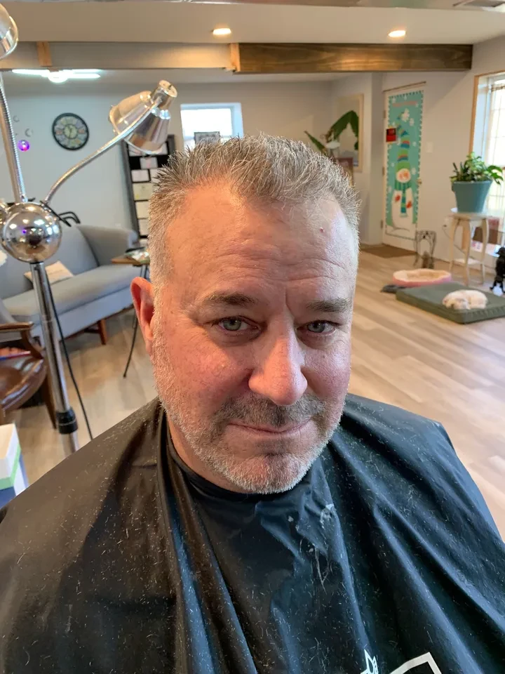Men's cut silver hair at Marisalon