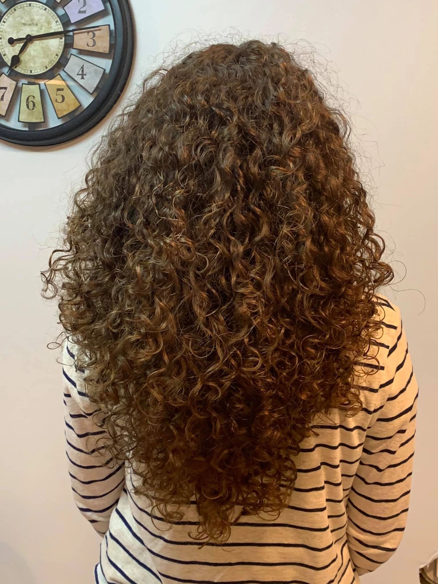 Long curly brown hair